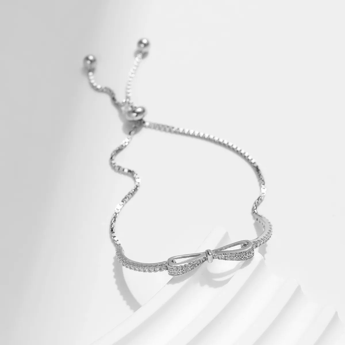 Sterling Silver Bow Knot Bracelet – IG Style, Rhodium Plated Sparkle