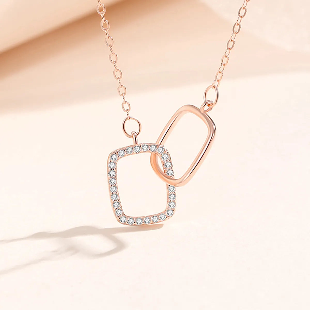 925 Sterling Silver Rhinestone Interlocking Square Pendant Necklace – NDIY139