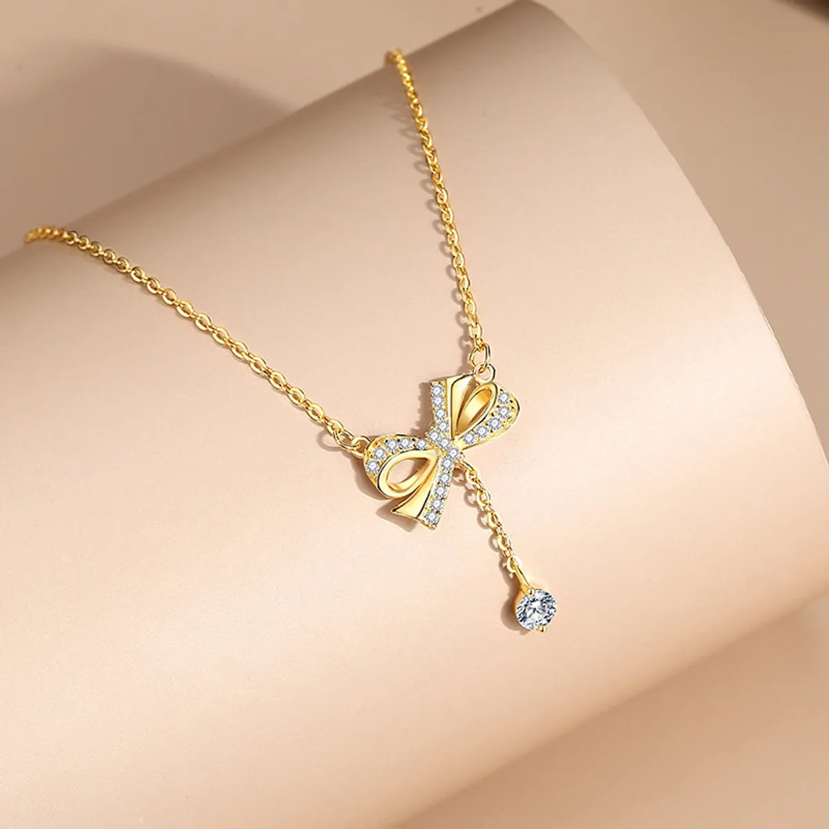 Simple Style Bow Knot Sterling Silver Pendant Necklace with Zircon Inlay