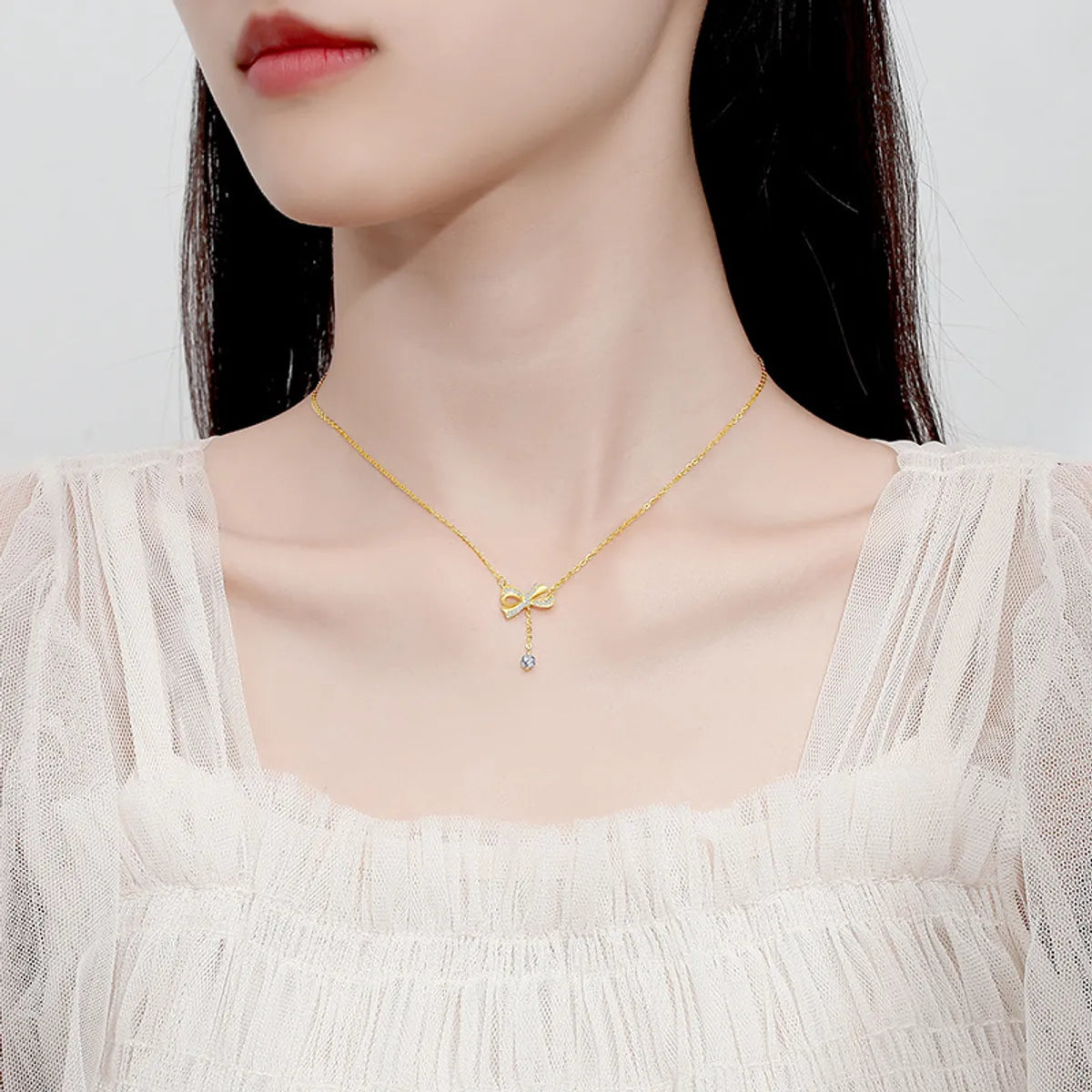 Simple Style Bow Knot Sterling Silver Pendant Necklace with Zircon Inlay