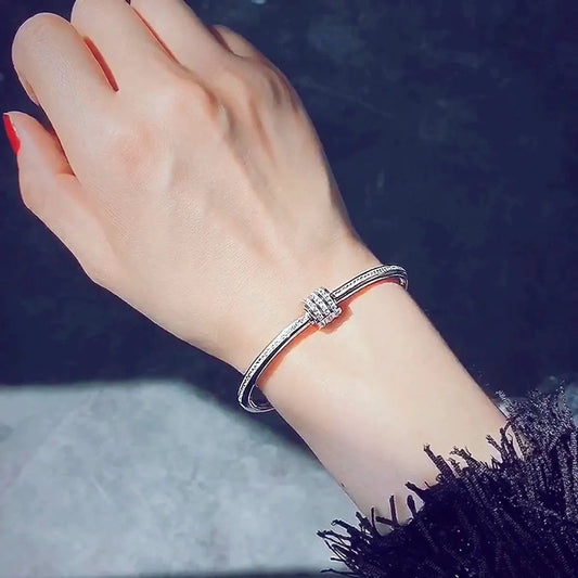 Titanium Steel Bangle with Triple Ring Charm & Rhinestones – Dariya Jewelry
