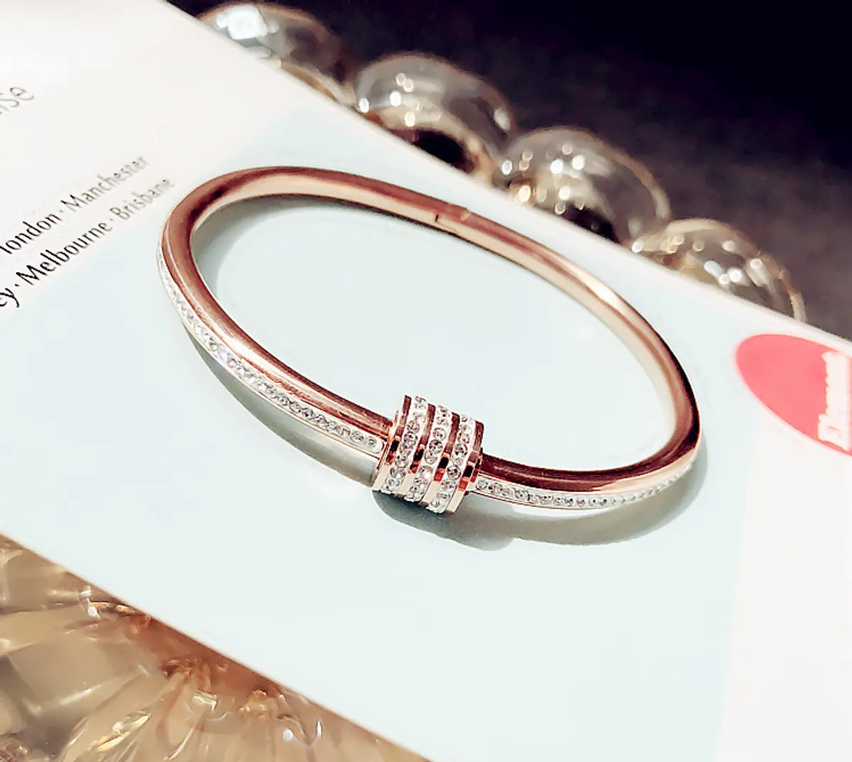 Titanium Steel Bangle with Triple Ring Charm & Rhinestones – Dariya Jewelry